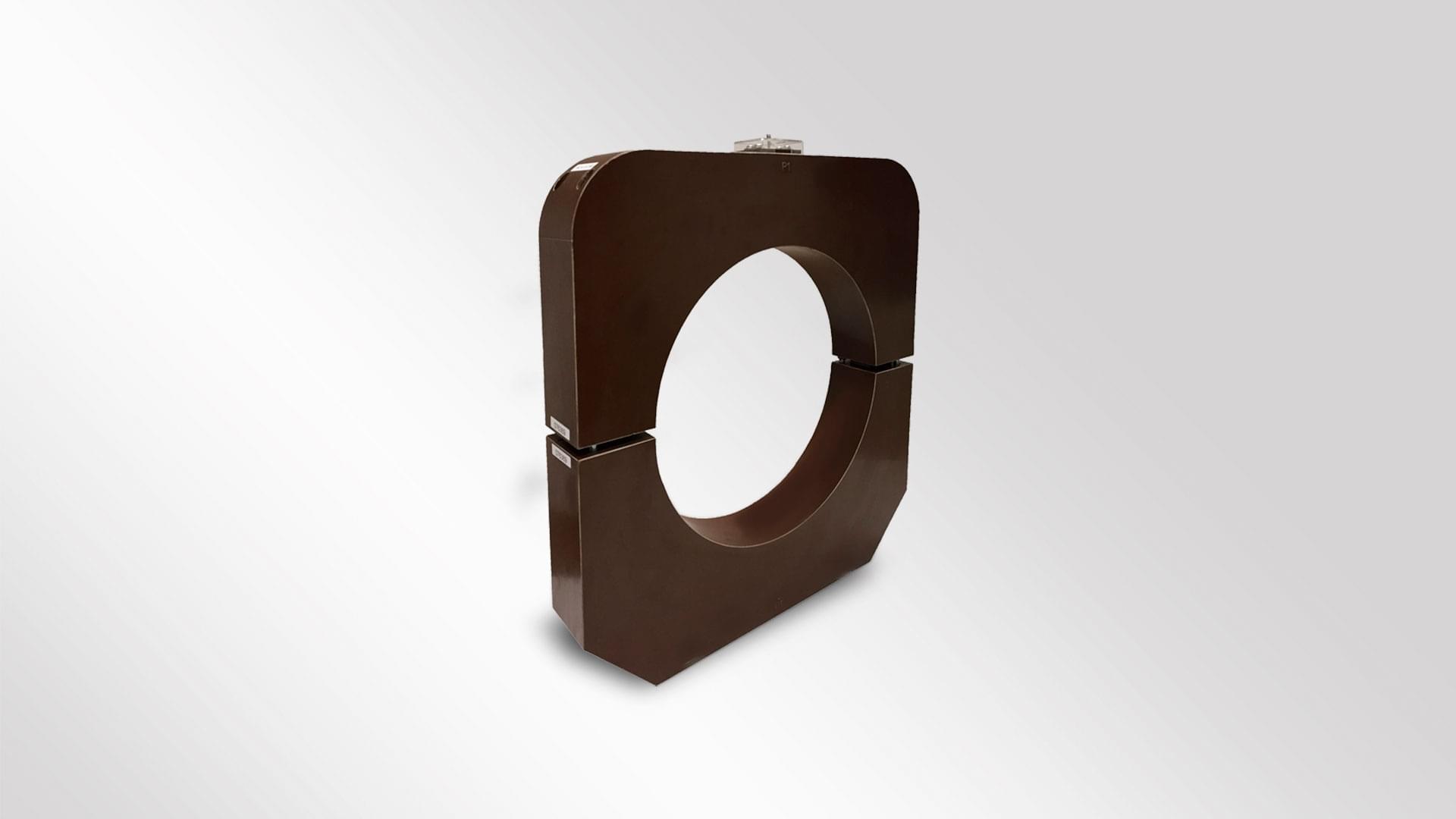 A brown toroidal current transformer which is suitable for both metering and protection purposes